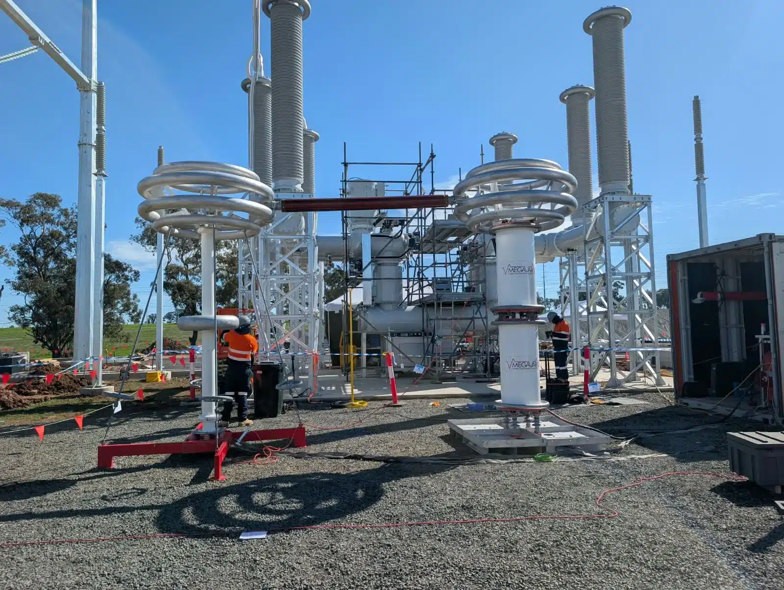 Megavar resonant hipot test set, reactor and voltage divider, connected to new gas-insulated switchgear for an on-site HV withstand test